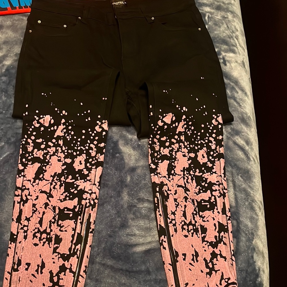 Worn once copper 9 jeans stretchy fit zipper at bottom of jeans.
